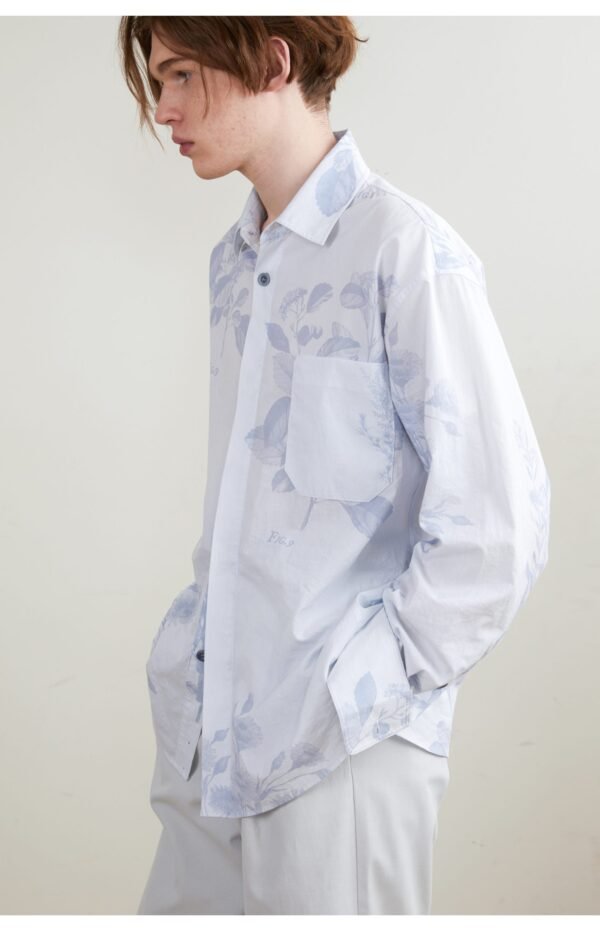 The light blue long sleeve shirt is smooth and draped