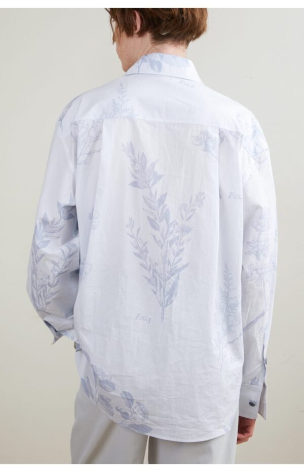 The light blue long sleeve shirt is smooth and draped